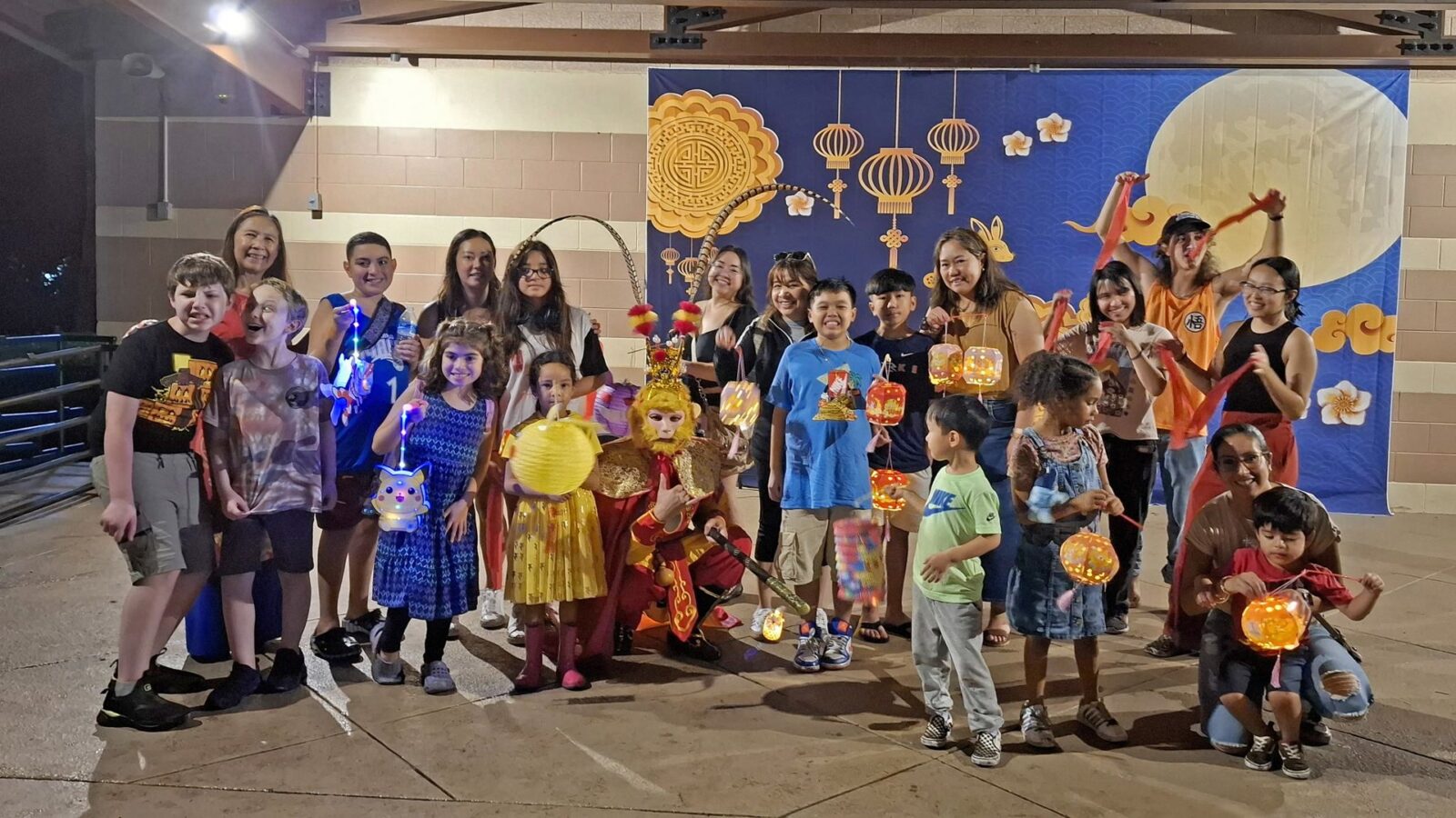 Moon Over Avalon Mid-Autumn Festival night market — families with lanterns at Avalon Park.