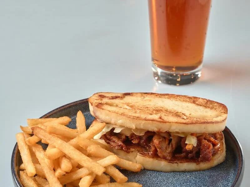 Sujuo Korean slider with fries and a tall beer