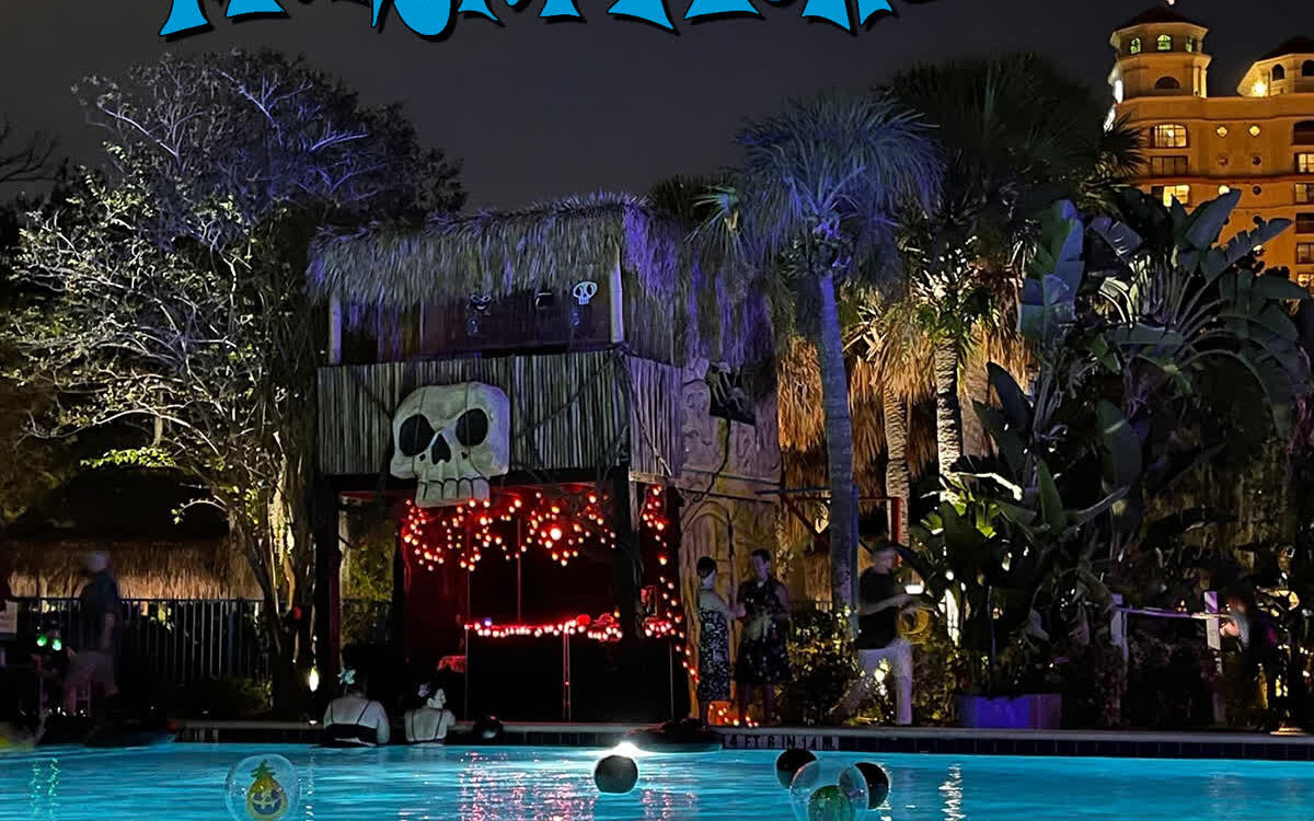 Night Monster Moku pool party with skull-topped tiki hut