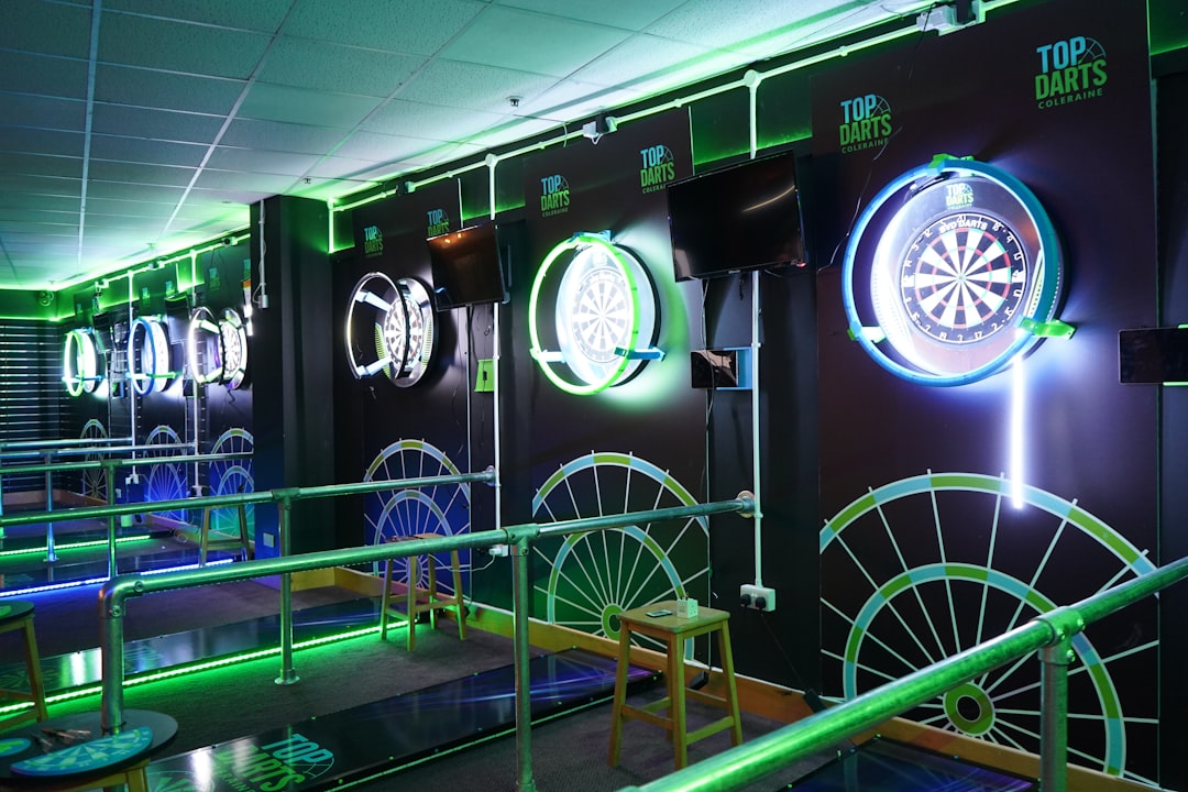 Illuminated lanes inside an axe-throwing bar